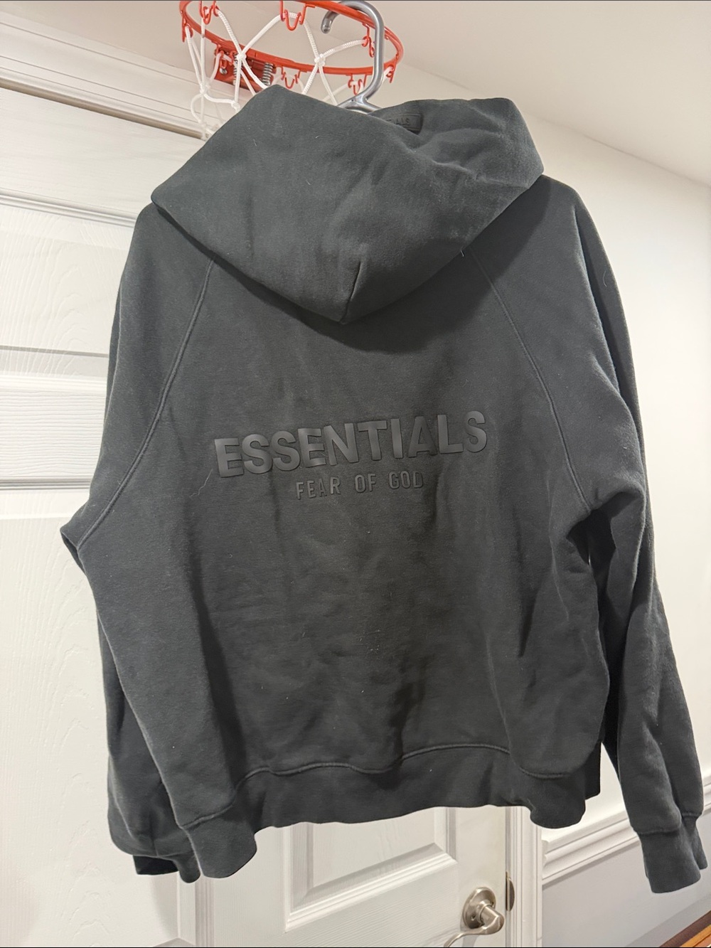Fear of God Essentials Men's Black Hoodie with Embossed Logo
